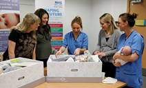 Baby Boxes Begin: First Minister gifts first Baby Boxes to expectant parents.