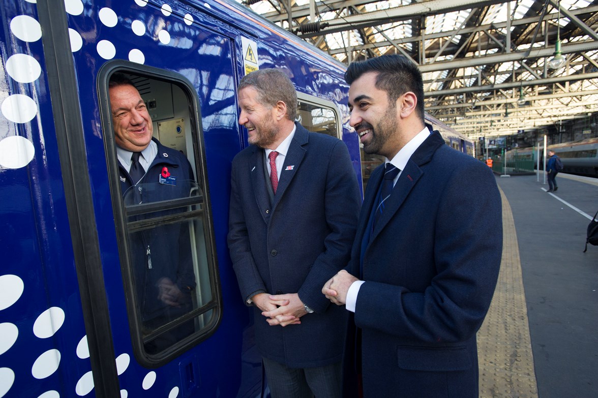 Humza Yousaf, Minister for Transport and the Islands, and Phil Verster,  ScotRail Alliance Managing Director, chat with driver of the latest refurbished c320 added to ScotRail fleet at Glasgow Central