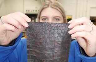 University of Brighton graduate Imogen Gray with her repurposed form of leather