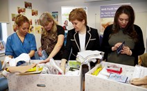 Baby Boxes Begin: First Minister gifts first Baby Boxes to expectant parents.