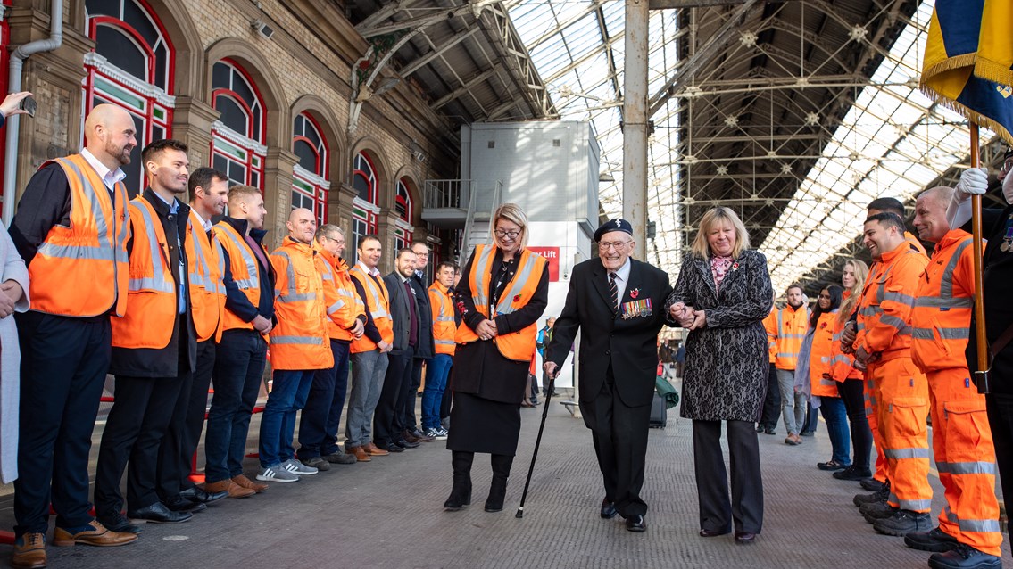 101-year-old World War II veteran's emotional send-off on Remembrance railway journey to London: Ernest Horsfall receiving a guard of honour by Network Rail staff