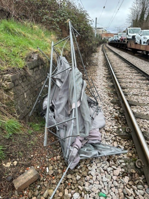 On the loose in north London: flying gazebo causes train delays: Remains of the gazebo that was found on the tracks
