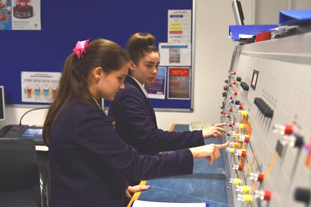 Caitlin and Sanel learn to operate a railway using Network Rail's signaller simulating equipment (1)
