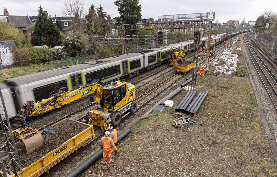 London Northwestern Railway train passing Willesden track upgrade worksite March 2021