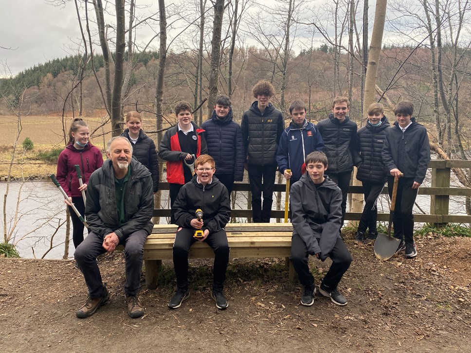 Ged Connell (Moray Council Countryside Ranger) and Speyside High School S3 pupils* with the new bench.

*Pupils: Erin Addison; Kiran Aylward; Jack Fleming; Aiden Harvey; Ruben Innes; Finlay MacPherson; Ashley McDonald; Lewis Myron-Petrie; Mackenzie Reed; Kylan Templeton; Patrick Turner.