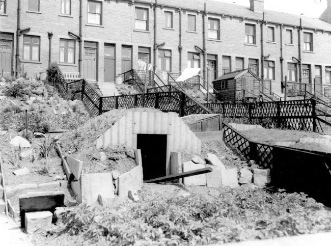 Anderson shelter built into a front garden in Leeds : Anderson air-raid shelter in a Leeds front garden. Credit Leeds Library Service