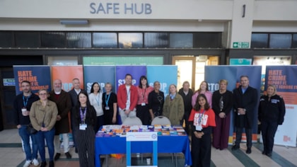 Train commuters engaged in conversations on hate crime