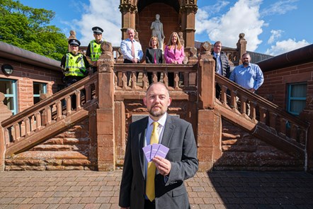 Cllr Ingram with PS Paul Tomkinson and Craig Marshall from Police Scotland, David Doran and Janie McKie from Health and Safety, Cathy Dunlop (Registration Services), Nick Kelly (Bereavement Services) and Kevin Wells