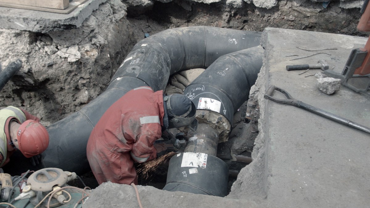 Insulated pipes below street level which carry hot water from the energy centre around the network