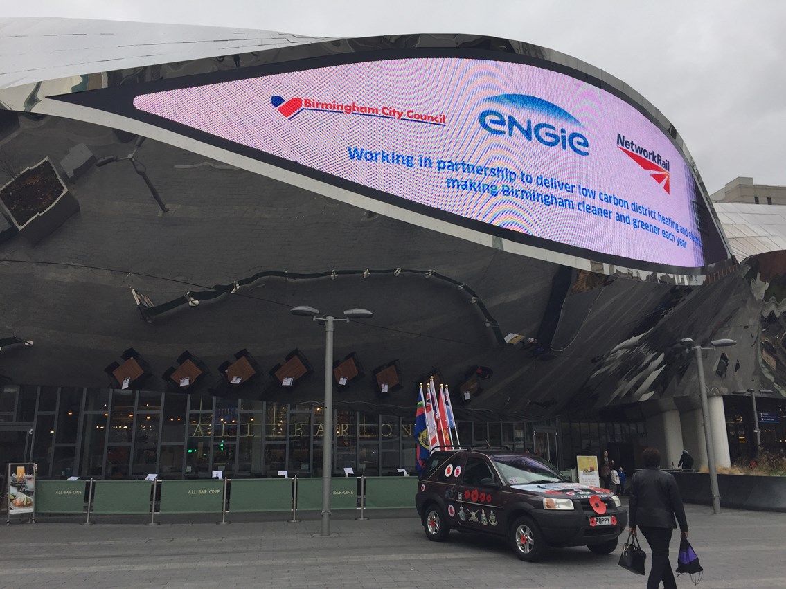 Low carbon sign shown on the eye outside Birmingham New Street