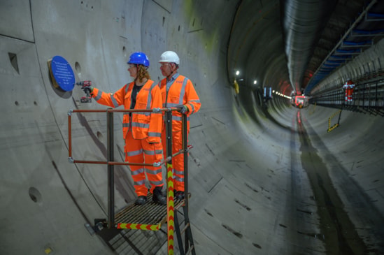 Director of the Brunel Museum Katherine McAlpine installs new plaque in the Euston Tunnel alongside HS2 CEO Mark Wild: Director of the Brunel Museum Katherine McAlpine installs new plaque in the Euston Tunnel alongside HS2 CEO Mark Wild