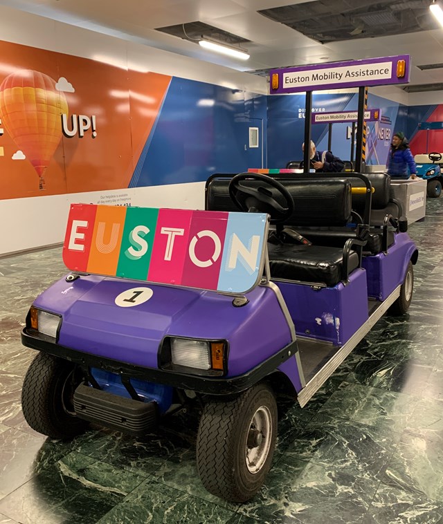 Retired assistance buggy at London Euston station