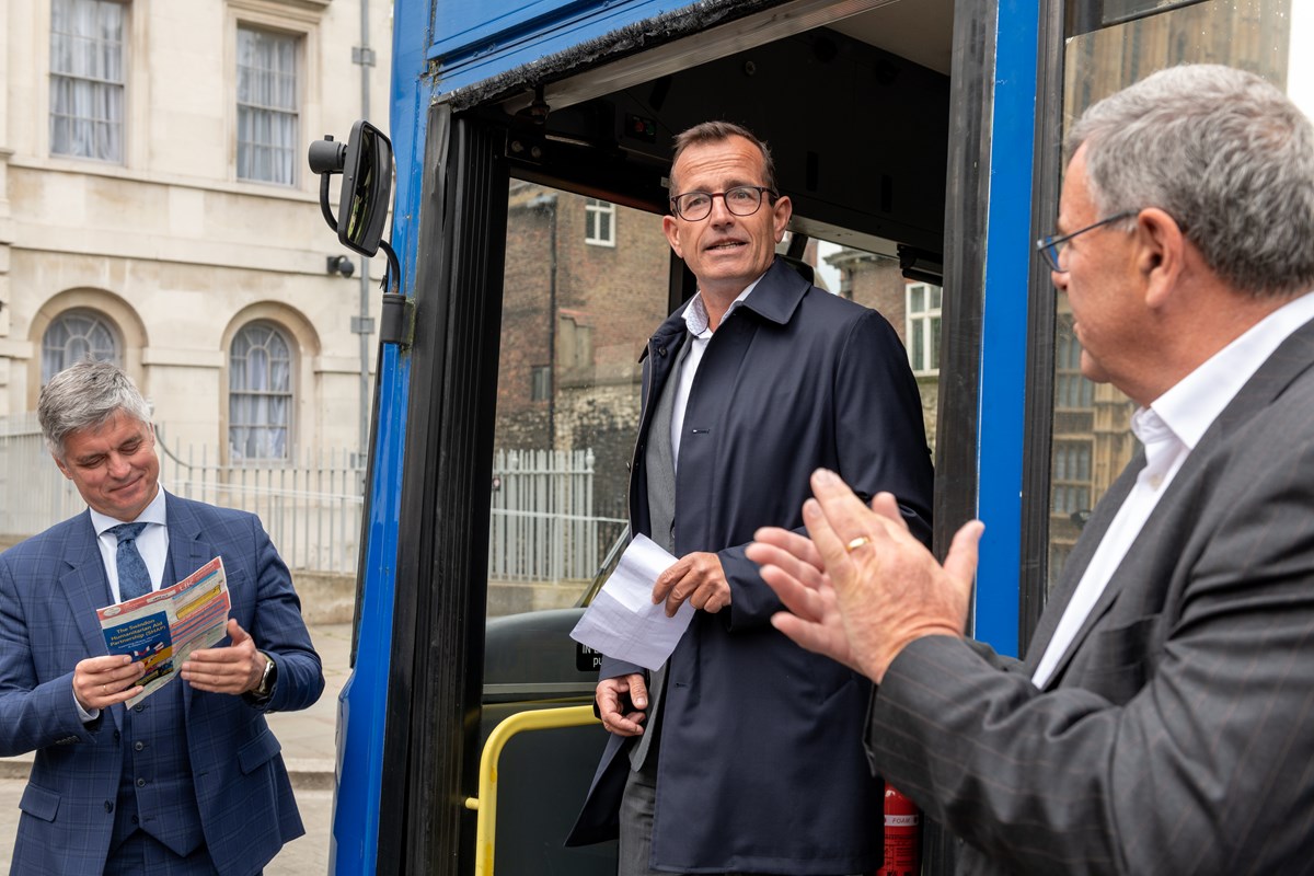 Christian Schreyer, Chief Executive of The Go-Ahead Group, presents a bus converted into a field hospital to the Ukrainian ambassador.
Left to right: Vadym Prystaiko, Ukrainian Ambassador to the UK; Christian Schreyer, Chief Executive of The Go-Ahead Group; Mike Bowden, Chair of Swindon Humanitarian