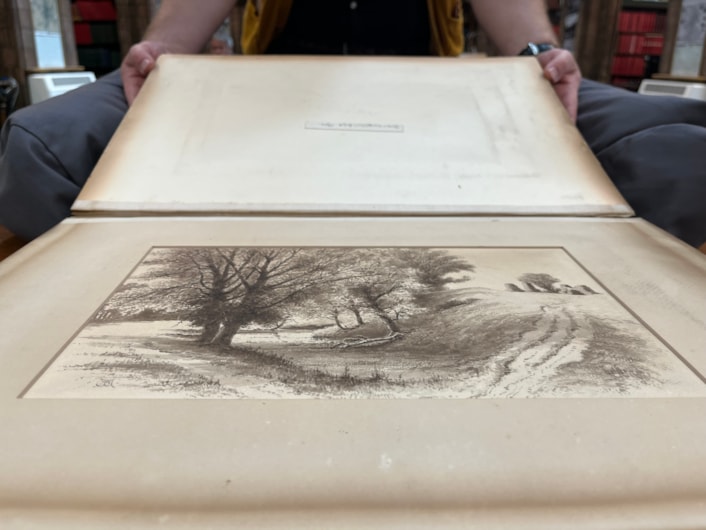 Battle books event: Librarian Josh Flint with a stunning collection of Wagstaffe Yorkshire Battle drawings from the 19th century, which include a series of beautifully detailed illustrations from the battlefields of Yorkshire.