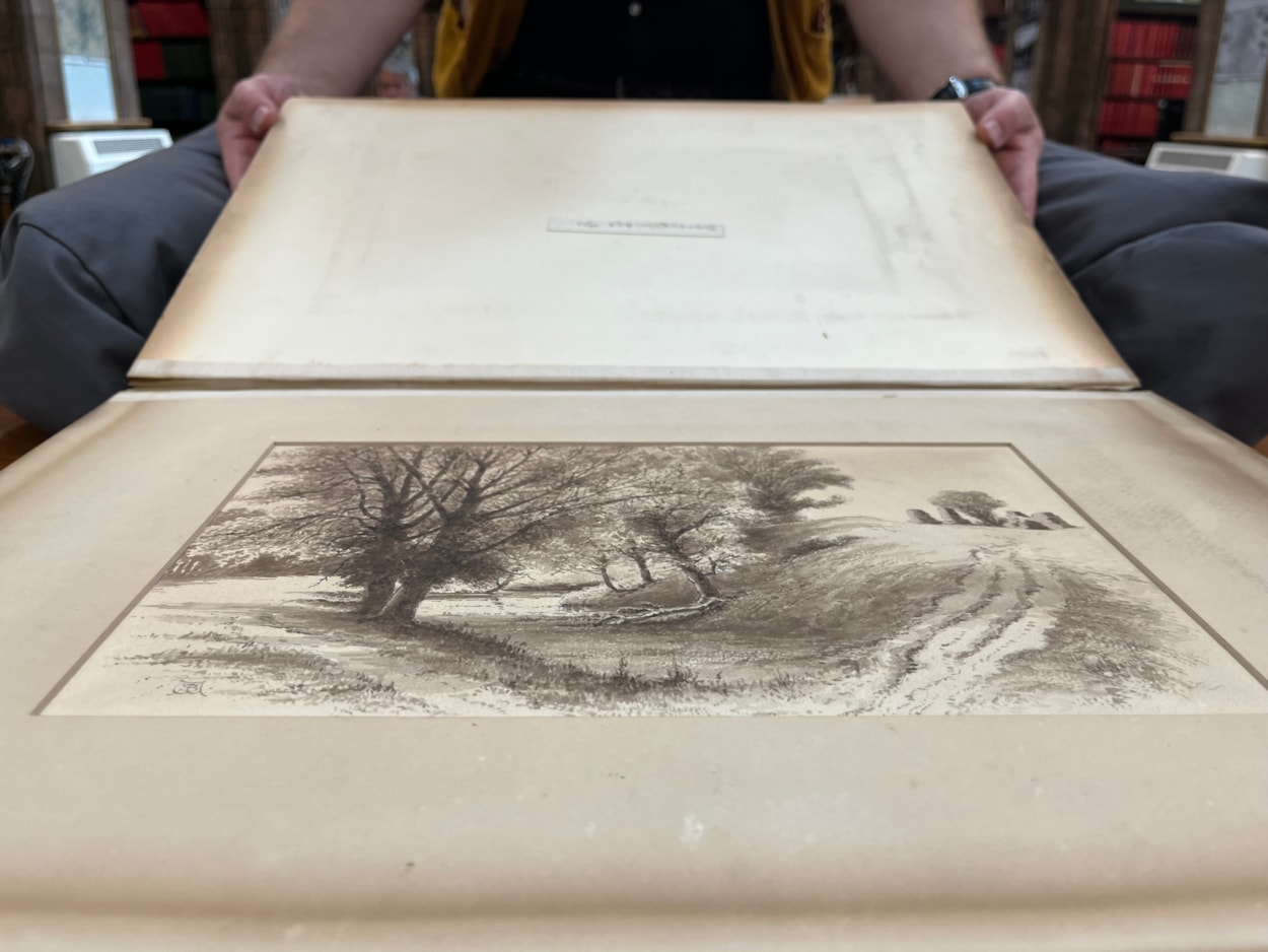 Battle books event: Librarian Josh Flint with a stunning collection of Wagstaffe Yorkshire Battle drawings from the 19th century, which include a series of beautifully detailed illustrations from the battlefields of Yorkshire.