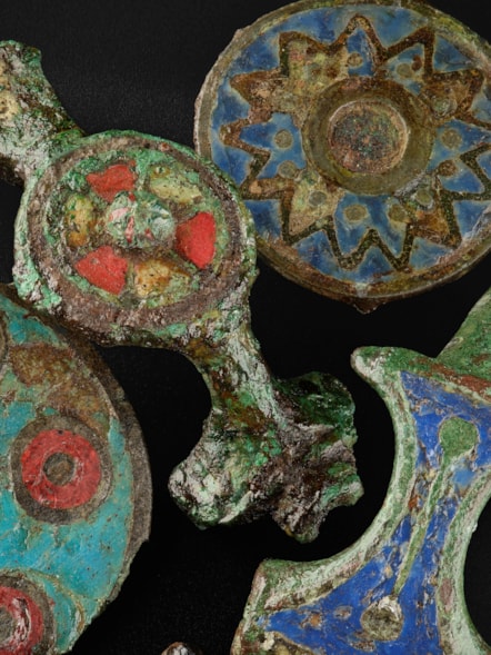 Enamelled brooches, c. 1st - 2nd Century AD. Photo © National Museums Scotland