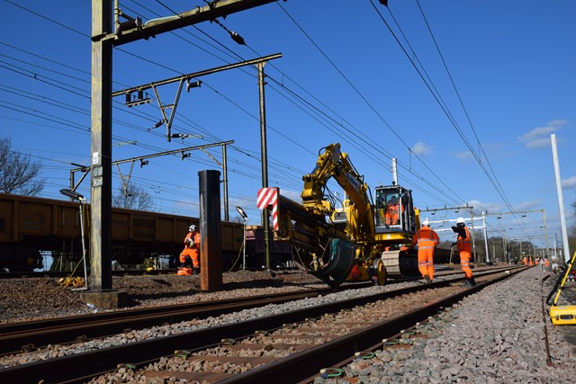 May Day rail investment programme promises less disruption for passengers in Anglia: Fambo machine to dig foundation piles for electrification equipment (3) Easter