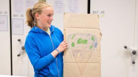 Bridget, aged 14, with her School Strike for Climate placard at the National Museums Colletion Centre. Photo (c) Duncan McGlynn (2)