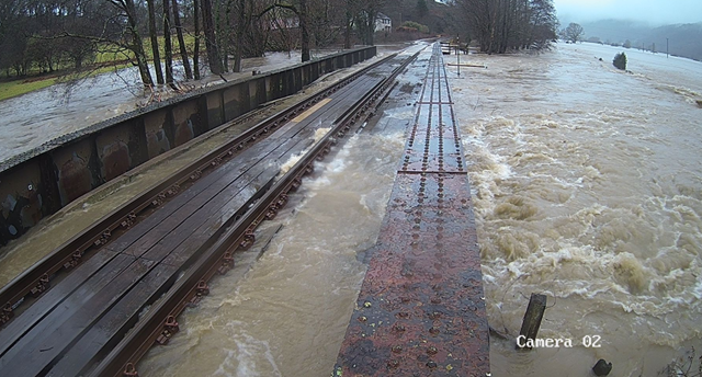 Bridge over troubled water: £3.6m bridge lift to reduce passenger flood delays: black bridge flooding