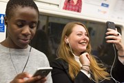 TfL Image - Passengers using phones underground
