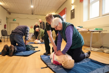 Paul Brolly and local residents carrying our CPR