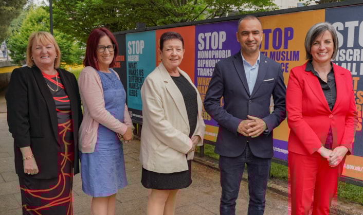 Executive members 2: Councillors Debra Coupar, Fiona Venner, Mary Harland, Mohammed Rafique and Helen Hayden with anti-discrimination campaign posters. The Leeds City Council campaign has communicated non-tolerance for misogyny, racism, anti-Muslim prejudice, antisemitism, ageism, homophobia, biphobia and transphobia, a