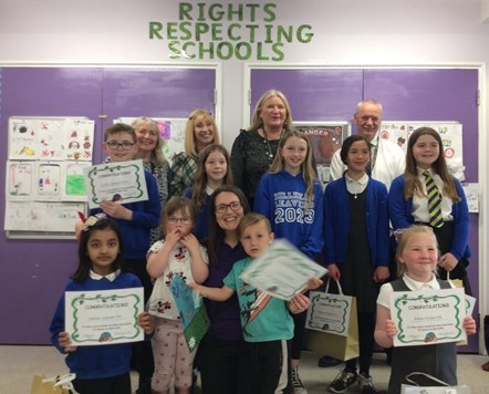 Eddie Fraser, Linda McAulay Griffiths, Janie Allen, Isabelle Campbell, Head of Centre and Lynne Hettrick, from Hillbank ECC with the winners