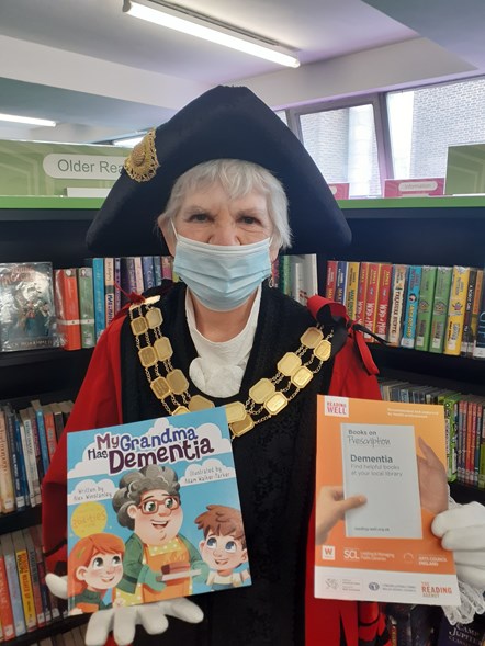 Cllr Janet Burgess, Mayor of Islington, with books from the Islington Libraries reading list for Dementia Action Week