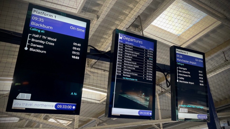 This image shows the new full colour screens being installed across Northern stations