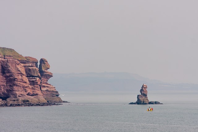 RIB at Teignmouth 6: Unmanned Aerial Vehicle (UAV) being launched from a Rigid Inflatable Boat (RIB) at Teignmouth as part of a geological survey to improve the resilience of the railway between Exeter and Newton Abbot