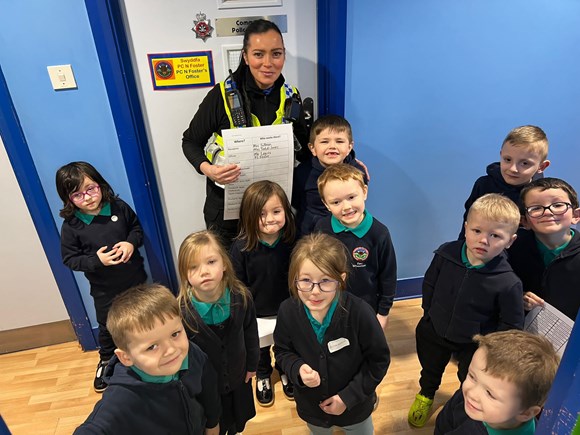 PCSO Natasha Foster with school children