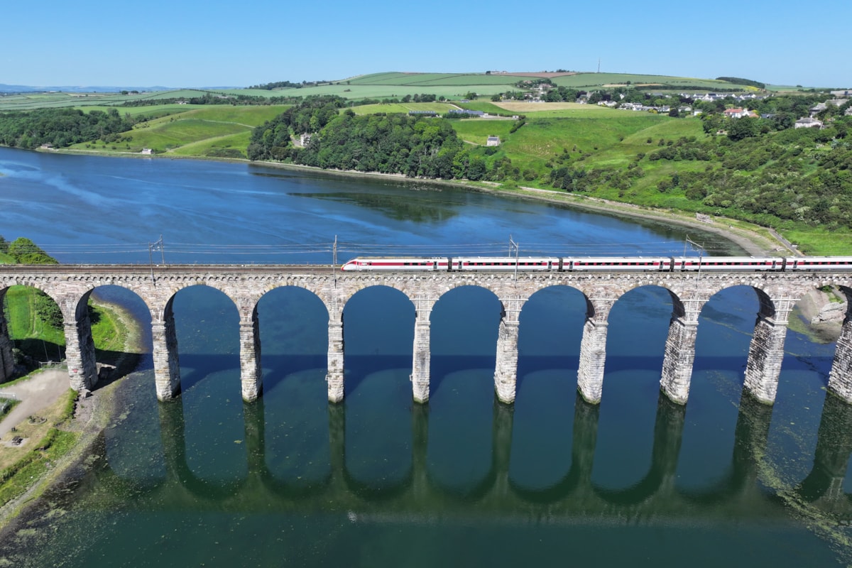 An LNER Azuma passing over the Royal Border Bridge