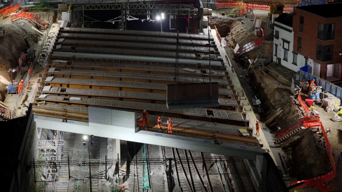Night shot of pre-made bridge parapet panels being craned in at Greek Street August 2025