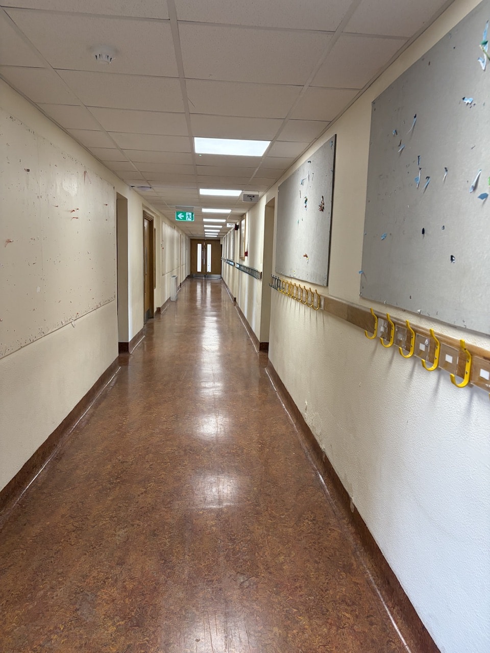 A long, narrow hallway from the building of the former Oldhill school