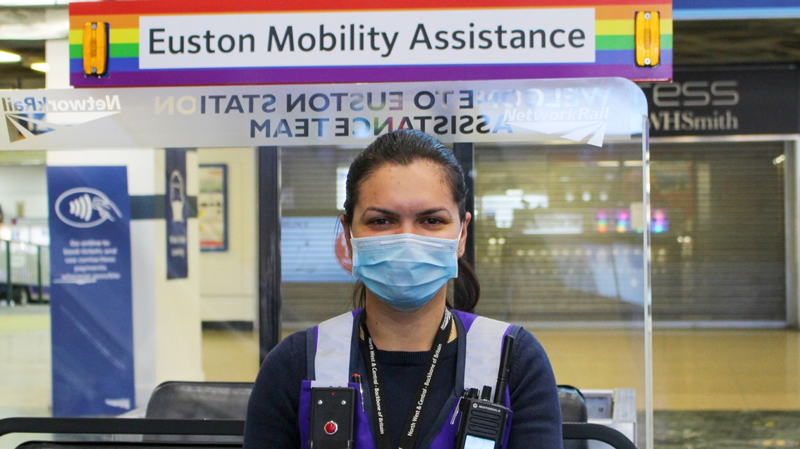 Customer service assistant Denisa wearing a face covering at London Euston-2
