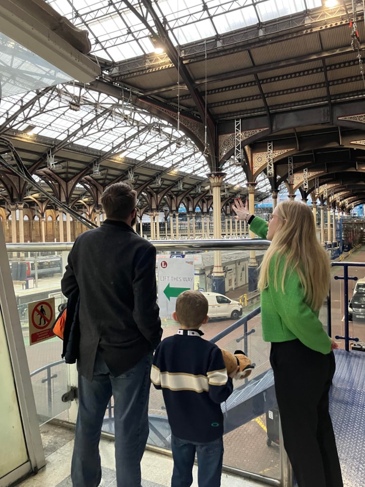 Austin and Austin's dad with station manager, Sara Ashmore Barrios