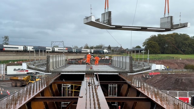 Time-lapse shows huge railway bridge construction ahead of M6 renewal: Old bridge from new Clifton bridge with M6 and Avanti train in the background copy