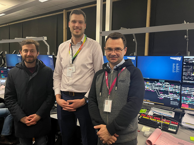 Digital future of signalling on the East Coast Main Line takes major step forward after section commissioning: Toufic Machnouk, Ed Akers, and Alin Albu in front of the Hitchin workstation at York ROC, Network Rail