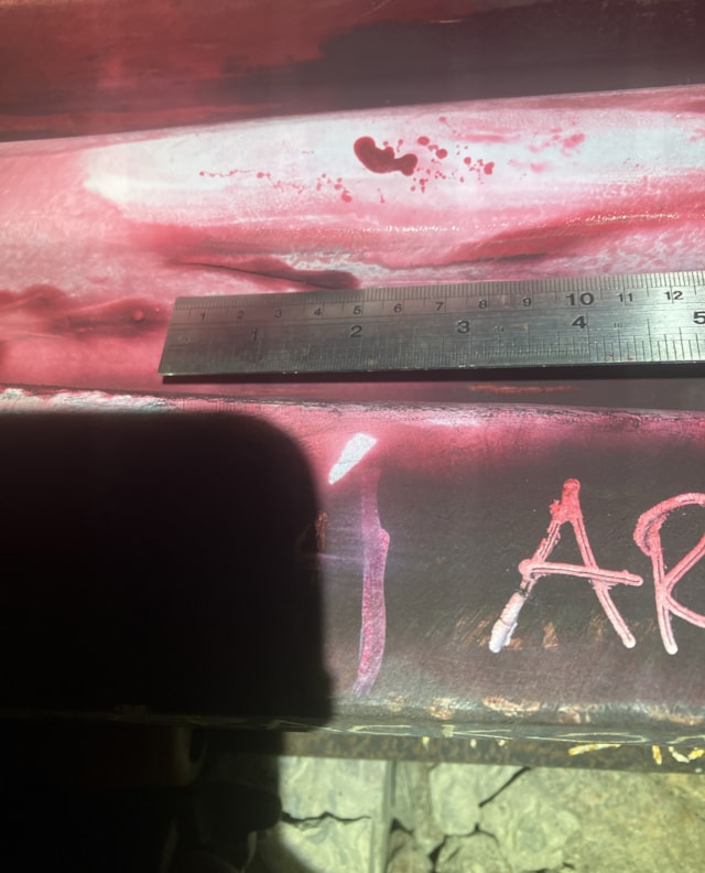 The rail to be replaced. A red dye has been used to show the fault: The rail to be replaced. A red dye has been used to show the fault