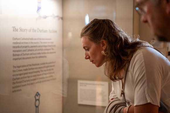 Press release - Magna Carta and the North exhibition opens at Durham Cathedral inviting visitors to reflect on power, justice, and legacy: Visitor viewing the newly opened Magna Carta and the North exhibition at Durham Cathedral