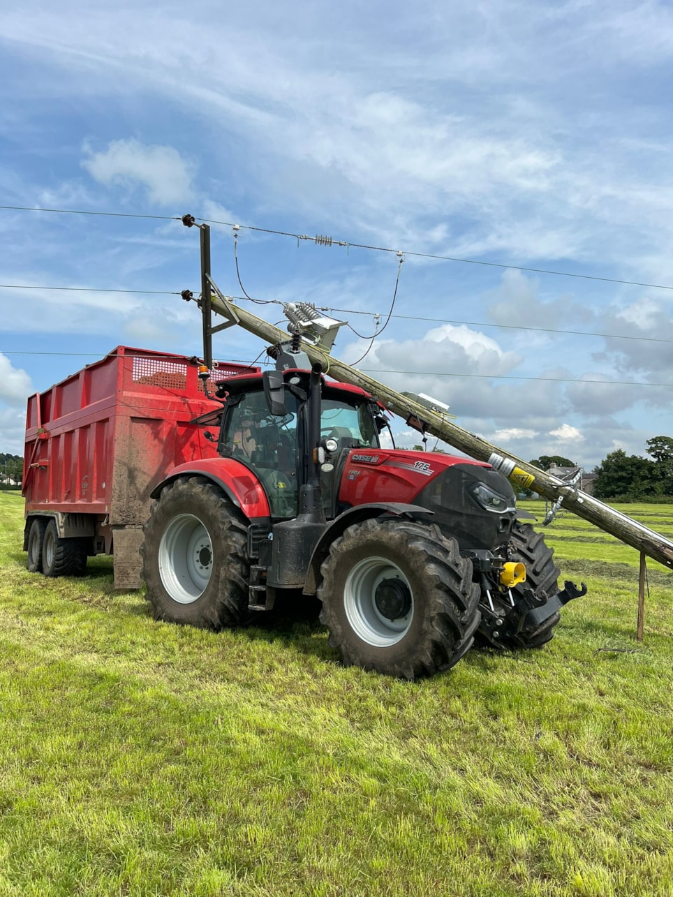 A tractor which collided with a wood pole