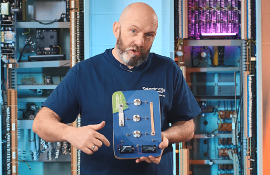 A Bright Sparks representative showing how a circuit board works