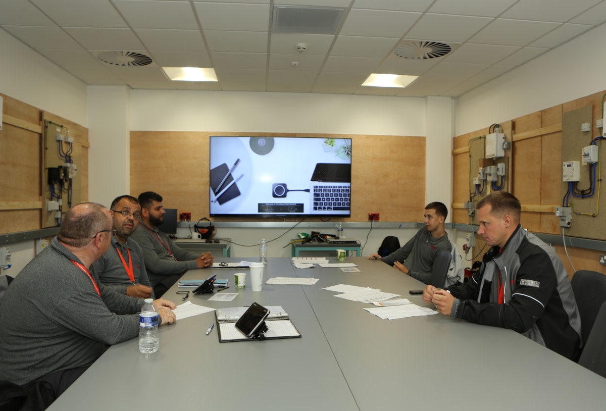 Trainees inside smart meter training classroom at E.ON's Net Zero Academy in Kingswinford, UK.