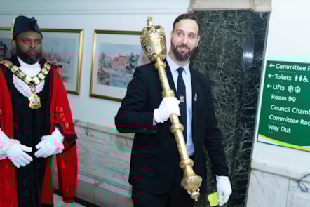 Mayor of Islington, Cllr Jason Jackson walking alongside the Mace-bearer