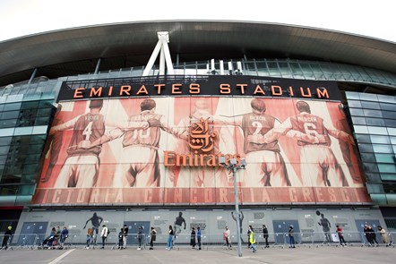 People queue for appointments at the mass vaccination centre at the Emirates Stadium