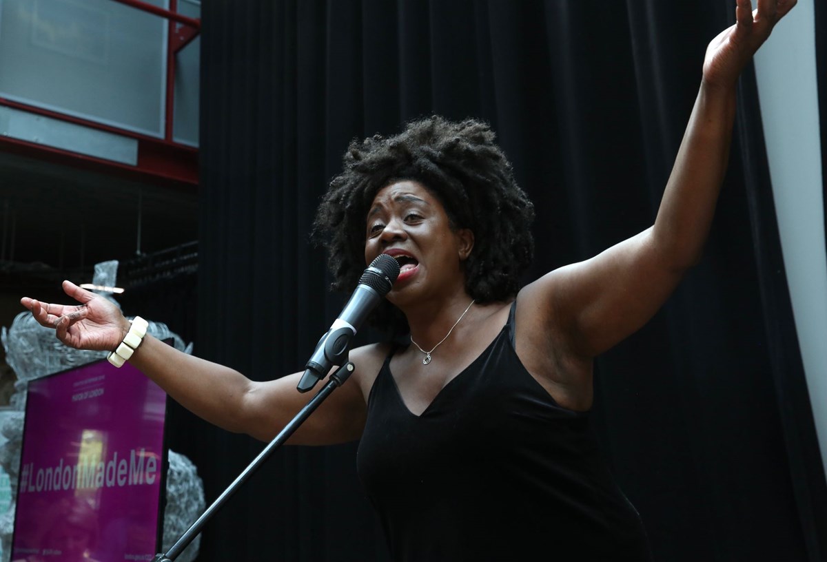 Artist performing at the announcement event in Westminster
