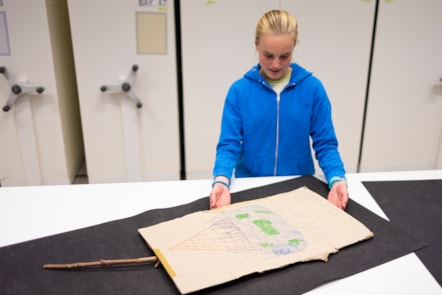 Bridget, aged 14, with her School Strike for Climate placard at the National Museums Colletion Centre. Photo (c) Duncan McGlynn (1)