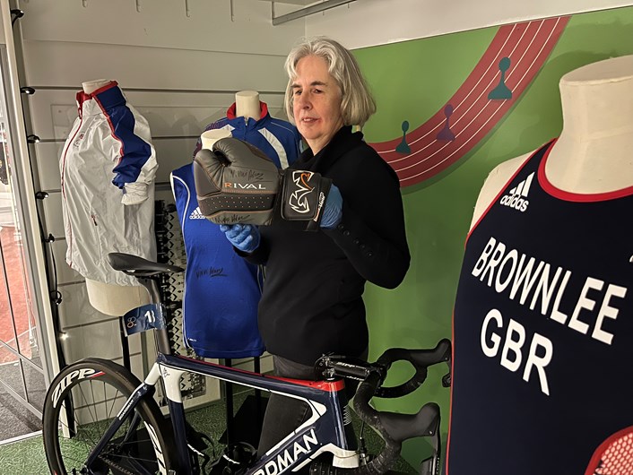 All to Play For: Kitty Ross, Leeds Museums and Galleries' curator of social history, with a glove and kit worn by Leeds-born double Olympic boxing champion Nicola Adams and a bike and kit worn by Alistair Brownlee, the only athlete to hold two Olympic triathlon titles.