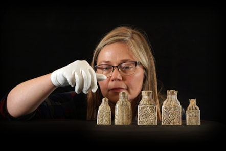 Dr Alice Blackwell with some of the Lewis chess pieces. Copyright Stewart Attwood (4)