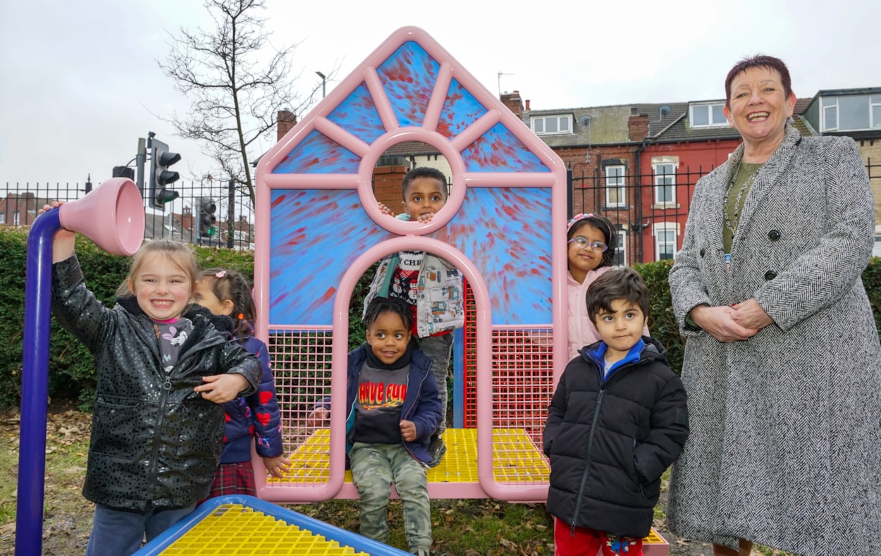 Compton 1: Councillor Mary Harland, Leeds City Council’s executive member for communities, customer service and community safety, with local youngsters at one of the new play installations.